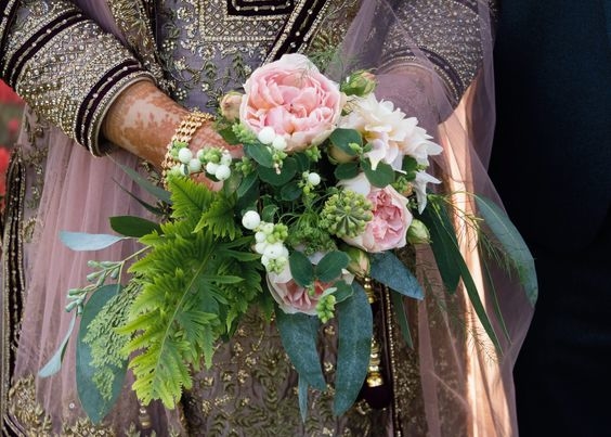 wild pink rose petite bouquet for a wedding at the Birmingham Botanical Gardens. Worcestershire, Warwickshire, Birmingham, West Midlands